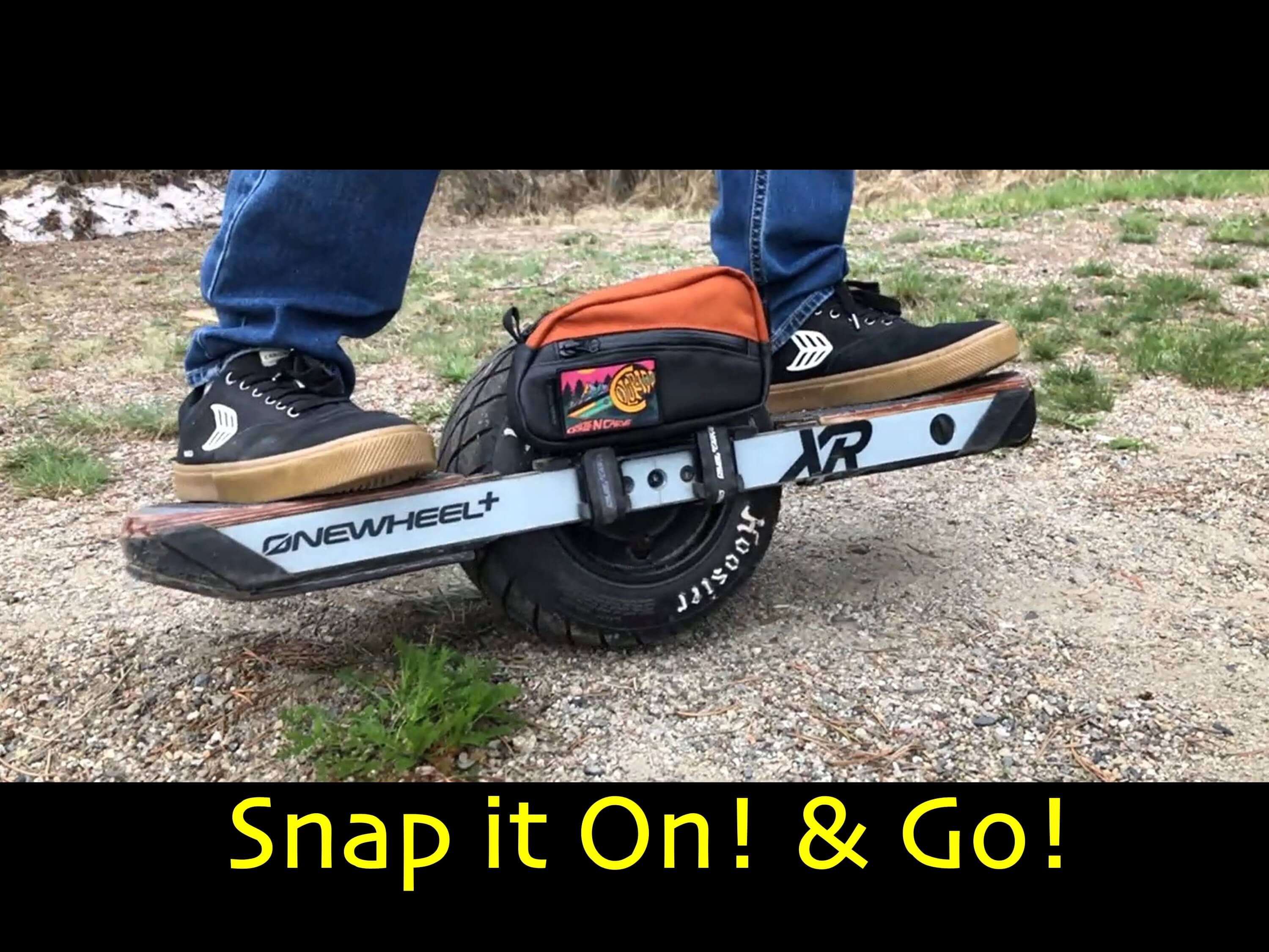Load video: Onewheel accessories pack snaps onto side of onewheel xr and rider rides away